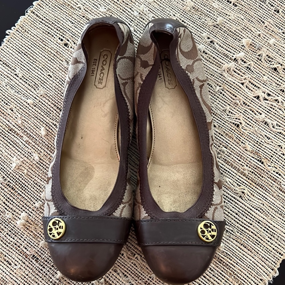 Coach slip on shoes.